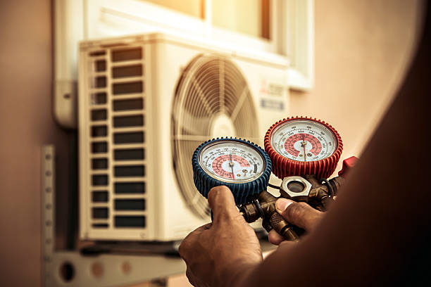 Professional Air Conditioning Service technician working in Greenwood, DE